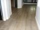 Bright living room features new wood floors and neutral paint at 4512 W Stoneman Dr, Anthem, AZ 85086