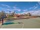 Community basketball court with palm trees, pavilion, and various recreational amenities at 6429 S Honor Ct, Gilbert, AZ 85298