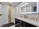 Modern bathroom with double vanity, walk-in shower, and gold accents at 7401 N Scottsdale Rd # 3, Paradise Valley, AZ 85253