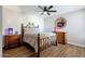 Cozy bedroom with bamboo bed frame and light wood furniture at 7401 N Scottsdale Rd # 3, Paradise Valley, AZ 85253