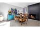 Charming dining area with fireplace and large windows at 7401 N Scottsdale Rd # 3, Paradise Valley, AZ 85253