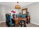 Elegant dining room with ornate wood table and chairs at 7401 N Scottsdale Rd # 3, Paradise Valley, AZ 85253
