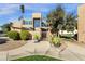 Inviting exterior with desert landscaping and gated entry at 7401 N Scottsdale Rd # 3, Paradise Valley, AZ 85253
