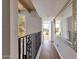 Bright hallway with hardwood floors and large mirror at 7401 N Scottsdale Rd # 3, Paradise Valley, AZ 85253