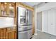 Stainless steel refrigerator in updated kitchen at 7401 N Scottsdale Rd # 3, Paradise Valley, AZ 85253