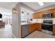 Updated kitchen featuring wood cabinets and quartz countertops at 7401 N Scottsdale Rd # 3, Paradise Valley, AZ 85253