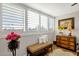Relaxing living space with white shutters and a bench seat at 7401 N Scottsdale Rd # 3, Paradise Valley, AZ 85253