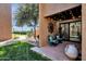 Covered patio with seating area and string lights at 7401 N Scottsdale Rd # 3, Paradise Valley, AZ 85253