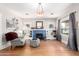 Bright living room featuring hardwood floors and a decorative fireplace at 38 W Lynwood St, Phoenix, AZ 85003