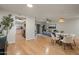 Open living and dining areas with access to the kitchen and a patio at 9445 N 94Th Pl # 102, Scottsdale, AZ 85258