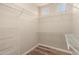 Spacious walk-in closet with ample shelving at 13335 W Broken Arrow Dr, Sun City West, AZ 85375
