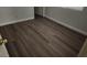 Simple bedroom with wood-look floors and neutral walls at 4321 E Desert Sky Ct, Cave Creek, AZ 85331
