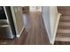 Bright hallway with wood-look floors and staircase at 4321 E Desert Sky Ct, Cave Creek, AZ 85331