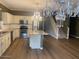 Open concept kitchen with an island and hardwood floors at 4321 E Desert Sky Ct, Cave Creek, AZ 85331