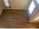 Spacious living room with large windows and wood-look floors at 4321 E Desert Sky Ct, Cave Creek, AZ 85331