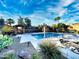 Community pool with a gazebo and desert landscaping featuring cacti and gravel, under a bright blue sky at 16914 E Britt Ct, Fountain Hills, AZ 85268