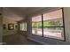 Elegant dining room with large windows offering abundant natural light at 5452 S Pyrite Cir, Gold Canyon, AZ 85118