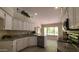 Renovated kitchen, featuring granite countertops and stainless steel appliances at 5452 S Pyrite Cir, Gold Canyon, AZ 85118