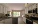 Bright kitchen boasts granite counters, stainless steel appliances, and ample cabinet space at 5452 S Pyrite Cir, Gold Canyon, AZ 85118