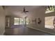 Open living area features high ceilings, tile floors and multiple windows at 5452 S Pyrite Cir, Gold Canyon, AZ 85118