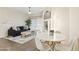 Bright living space showcasing modern decor, a decorative mirror, and adjacent dining area at 10401 N Saguaro Blvd # 224, Fountain Hills, AZ 85268