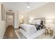 Spacious bedroom offering a view into the bathroom, ceiling fan and light-colored walls at 10401 N Saguaro Blvd # 224, Fountain Hills, AZ 85268