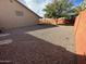 View of the backyard featuring gravel and brick landscaping at 3202 E Decatur St, Mesa, AZ 85213