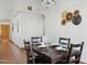 Charming dining room with seating for four and elegant decor at 3202 E Decatur St, Mesa, AZ 85213