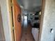 Inviting entryway with tile flooring, a decorative door, and a view into the living room at 3202 E Decatur St, Mesa, AZ 85213