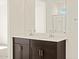 Bathroom featuring a double sink vanity and modern hardware and fixtures at 3451 E Alexander Dr, San Tan Valley, AZ 85143