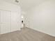 Cozy bedroom with plush carpet, closet, and bright white walls at 3451 E Alexander Dr, San Tan Valley, AZ 85143