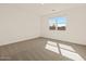 Inviting bedroom with neutral carpet, a large window, and natural light at 3451 E Alexander Dr, San Tan Valley, AZ 85143