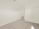 Neutral bedroom featuring plush carpeting, closet, and bright white walls at 3451 E Alexander Dr, San Tan Valley, AZ 85143