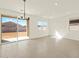Spacious living room with recessed lighting and sliding doors providing backyard views at 3451 E Alexander Dr, San Tan Valley, AZ 85143