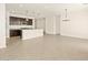 Open living space showcasing kitchen island and modern chandelier; perfect for entertaining at 3451 E Alexander Dr, San Tan Valley, AZ 85143