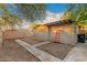 Backyard with storage shed and walkway at 821 E Roeser Rd, Phoenix, AZ 85040