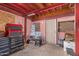 Unfinished basement with storage and workbench at 821 E Roeser Rd, Phoenix, AZ 85040