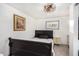 Bedroom with antique-style bed and dresser at 821 E Roeser Rd, Phoenix, AZ 85040