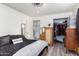 Main bedroom with walk-in closet and full-size bed at 821 E Roeser Rd, Phoenix, AZ 85040