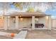 Charming one-story home with a covered porch and landscaping at 821 E Roeser Rd, Phoenix, AZ 85040
