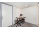 Small home office with a desk and chairs at 821 E Roeser Rd, Phoenix, AZ 85040