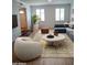 Bright living room with large windows, comfortable seating, and stylish decor at 3114 E Hazelwood St, Phoenix, AZ 85016