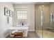 Bright bathroom featuring a soaking tub and glass-enclosed shower with natural light at 34599 N 99Th Way, Scottsdale, AZ 85262