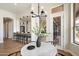 Charming breakfast nook with modern lighting, adjacent to the kitchen and entryway at 34599 N 99Th Way, Scottsdale, AZ 85262