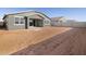New home with backyard and patio at 36933 W La Paz St, Maricopa, AZ 85138