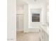Bathroom with soaking tub, walk-in shower, and double vanity at 36933 W La Paz St, Maricopa, AZ 85138