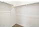 Empty closet with double hanging rods at 36933 W La Paz St, Maricopa, AZ 85138