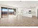 Modern kitchen with white cabinets, granite counters, and island at 36933 W La Paz St, Maricopa, AZ 85138