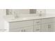 Double vanity with quartz countertop and chrome fixtures at 36933 W La Paz St, Maricopa, AZ 85138
