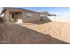 A spacious backyard with the potential for customization and landscaping at 36944 W Prado St, Maricopa, AZ 85138